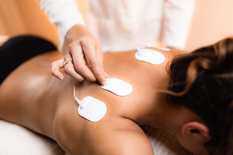 Electrical muscle stimulation therapy at Dallas Spine Center in Carrollton, TX