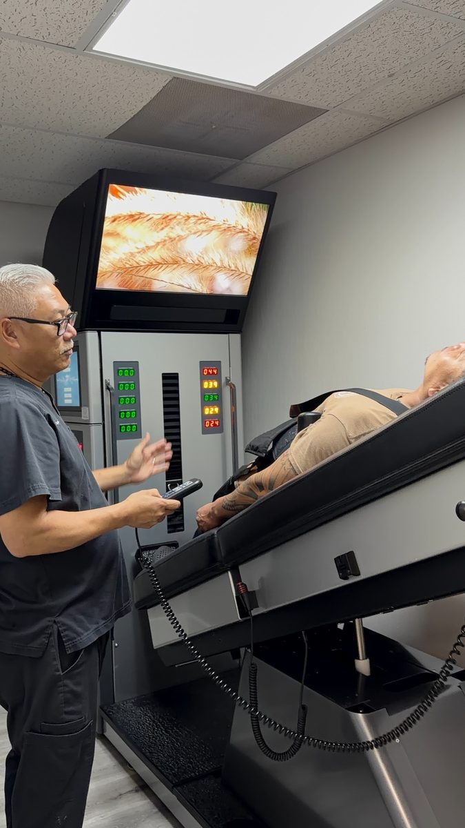 Spinal decompression treatment in progress on the DRX9000 at Dallas Spine Center in Carrollton, TX